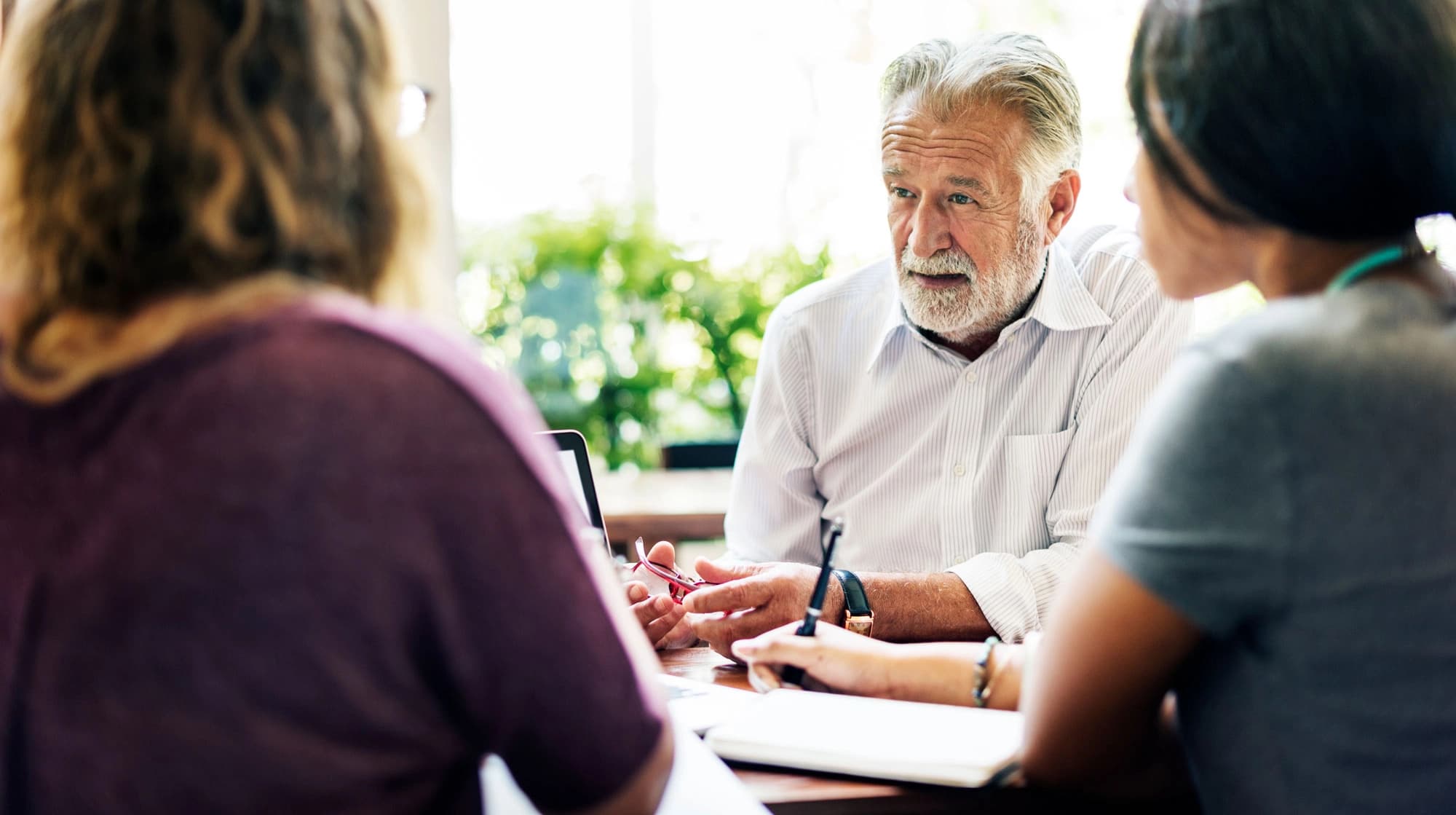 Meeting between three individuals